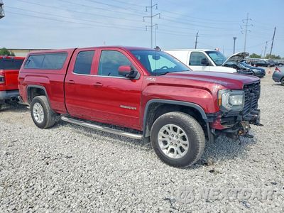 Czwarte zdjęcie samochodu z boku: 2018 GMC SIERRA K1500 SLE VIN:1GTV2MEC0JZ369691 - miniatura
