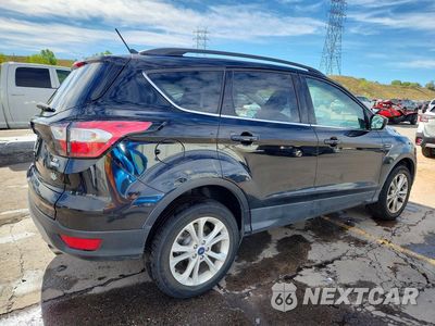 Trzecie zdjęcie samochodu z tyłu: 2018 FORD ESCAPE SE VIN:1FMCU9GD5JUA60103 - miniatura