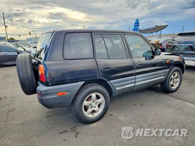 Trzecie zdjęcie samochodu z tyłu: 1997 TOYOTA RAV4 BASE VIN:JT3GP10V1V7012415 - miniatura