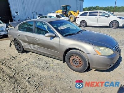 Czwarte zdjęcie samochodu z boku: 2003 NISSAN ALTIMA 2.5 VIN:1N4AL11D93C294669 - miniatura