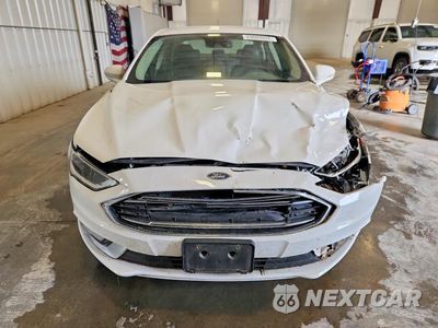 Piąte zdjęcie samochodu w środku: 2017 FORD FUSION SE HYBRID VIN:3FA6P0LU9HR287263 - miniatura