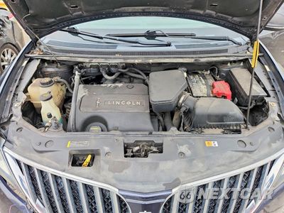 Zdjęcie 12 z 13 samochodu: 2013 LINCOLN MKX VIN:2LMDJ8JK5DBL12249 - miniatura