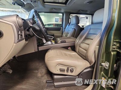 Zdjęcie 7 z 14 samochodu: 2004 HUMMER H2 VIN:5GRGN23U34H110279 - miniatura