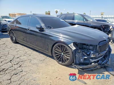 Czwarte zdjęcie samochodu z boku: 2020 BMW 750 XI VIN:WBA7U2C03LGM27272 - miniatura