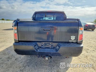 Zdjęcie 6 z 12 samochodu: 2006 HONDA RIDGELINE RT VIN:2HJYK16246H529544 - miniatura