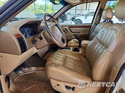 Zdjęcie 7 z 12 samochodu: 1999 JEEP GRAND CHEROKEE LIMITED VIN:1J4GW68NXXC770578 - miniatura
