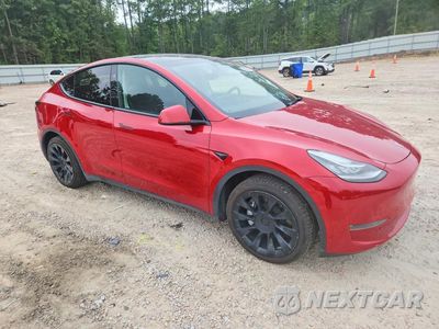 Czwarte zdjęcie samochodu z boku: 2023 TESLA MODEL Y VIN:7SAYGDEE6PA153830 - miniatura