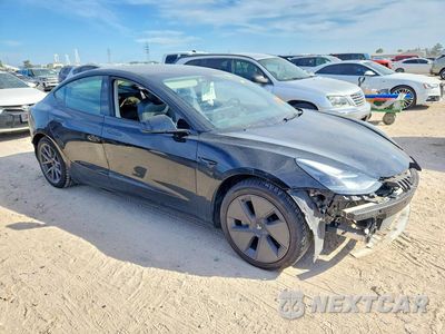Czwarte zdjęcie samochodu z boku: 2022 TESLA MODEL 3 VIN:5YJ3E1EB2NF264585 - miniatura