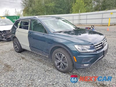 Czwarte zdjęcie samochodu z boku: 2019 VOLKSWAGEN TIGUAN SE VIN:3VV2B7AXXKM051644 - miniatura