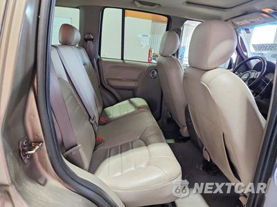 Zdjęcie 11 z 13 samochodu: 2004 JEEP LIBERTY LIMITED VIN:1J8GL58K34W195564 - miniatura