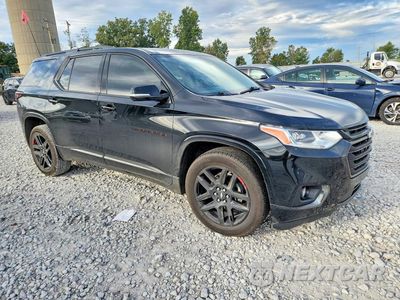 Czwarte zdjęcie samochodu z boku: 2019 CHEVROLET TRAVERSE PREMIER VIN:1GNEVKKW1KJ128000 - miniatura