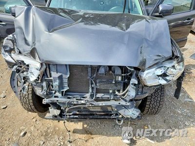 Zdjęcie 11 z 12 samochodu: 2018 TOYOTA TACOMA SR5 V6 VIN:3TMDZ5BN6JM040613 - miniatura