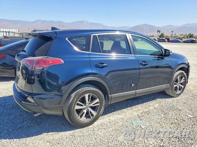 Trzecie zdjęcie samochodu z tyłu: 2018 TOYOTA RAV4 XLE VIN:JTMWFREV9JJ174033 - miniatura
