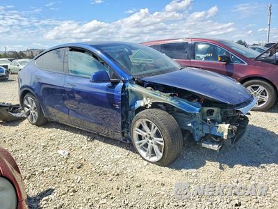 Czwarte zdjęcie samochodu z boku: 2022 TESLA MODEL Y VIN:7SAYGAEE3NF493127 - miniatura