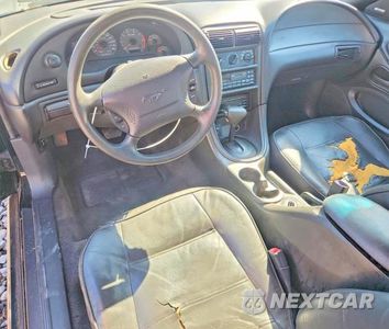Zdjęcie 8 z 12 samochodu: 1999 FORD MUSTANG VIN:1FAFP444XXF207177 - miniatura