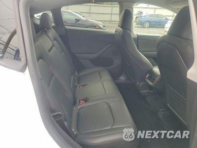 Zdjęcie 11 z 13 samochodu: 2024 TESLA MODEL Y VIN:7SAYGDEE9RA258493 - miniatura