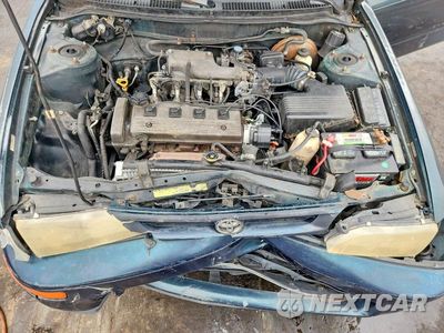 Zdjęcie 11 z 12 samochodu: 1997 TOYOTA COROLLA BASE VIN:1NXBA02E9VZ588653 - miniatura