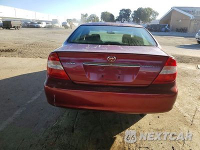 Zdjęcie 6 z 12 samochodu: 2002 TOYOTA CAMRY LE VIN:JTDBE32K020092420 - miniatura