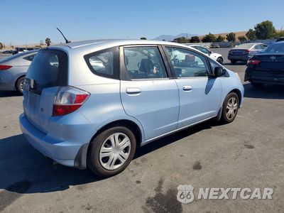 Trzecie zdjęcie samochodu z tyłu: 2009 HONDA FIT VIN:JHMGE88209S062809 - miniatura
