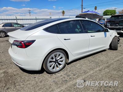 Trzecie zdjęcie samochodu z tyłu: 2023 TESLA MODEL 3 VIN:5YJ3E1EA0PF546458 - miniatura