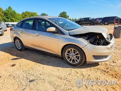 Czwarte zdjęcie samochodu z boku: 2018 FORD FOCUS SE VIN:1FADP3F22JL249364 - miniatura