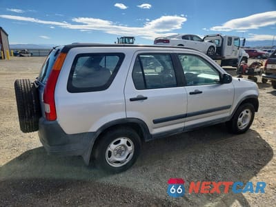 Trzecie zdjęcie samochodu z tyłu: 2002 HONDA CR-V LX VIN:JHLRD684X2C002459 - miniatura