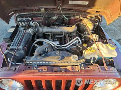 Zdjęcie 11 z 12 samochodu: 2004 JEEP WRANGLER / TJ SPORT VIN:1J4FA49S24P712522 - miniatura