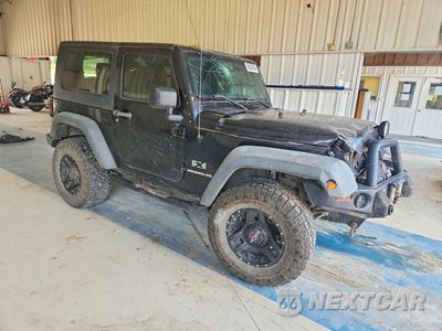 Czwarte zdjęcie samochodu z boku: 2009 JEEP WRANGLER X VIN:1J4FA241X9L746452 - miniatura
