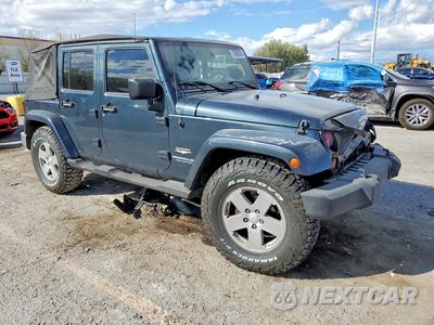 Czwarte zdjęcie samochodu z boku: 2007 JEEP WRANGLER SAHARA VIN:1J4GB59187L136381 - miniatura