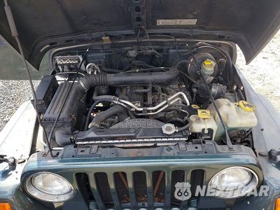 Zdjęcie 11 z 12 samochodu: 2003 JEEP WRANGLER COMMANDO VIN:1J4FA39S63P336688 - miniatura