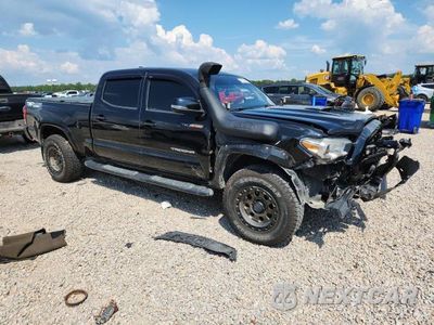 Czwarte zdjęcie samochodu z boku: 2018 TOYOTA TACOMA TRD SPORT VIN:3TMDZ5BN2JM054587 - miniatura