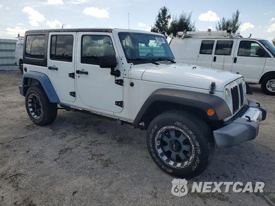 Czwarte zdjęcie samochodu z boku: 2014 JEEP WRANGLER UNLIMITED SAHARA VIN:1C4BJWEG0EL206987 - miniatura