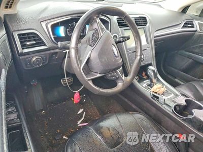 Zdjęcie 8 z 12 samochodu: 2014 FORD FUSION TITANIUM HEV VIN:3FA6P0RU5ER190225 - miniatura