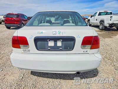 Zdjęcie 6 z 13 samochodu: 1998 HONDA CIVIC LX VIN:1HGEJ6675WL045101 - miniatura