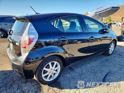 Trzecie zdjęcie samochodu z tyłu: 2012 TOYOTA PRIUS C FOUR VIN:JTDKDTB34C1023916 - miniatura