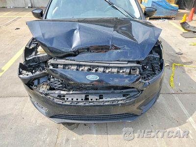 Zdjęcie 11 z 12 samochodu: 2018 FORD FOCUS SE VIN:1FADP3F28JL288525 - miniatura