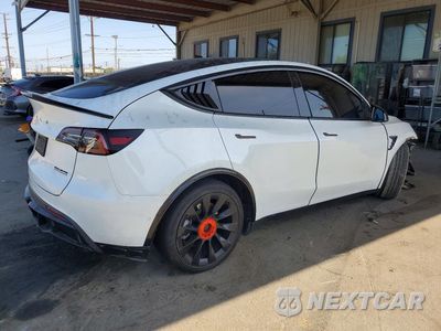 Trzecie zdjęcie samochodu z tyłu: 2021 TESLA MODEL Y VIN:5YJYGDEE6MF212760 - miniatura