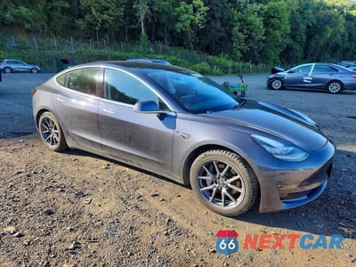 Czwarte zdjęcie samochodu z boku: 2020 TESLA MODEL 3 VIN:5YJ3E1EB6LF616337 - miniatura