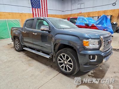 Czwarte zdjęcie samochodu z boku: 2019 GMC CANYON DENALI VIN:1GTG6EEN1K1332668 - miniatura