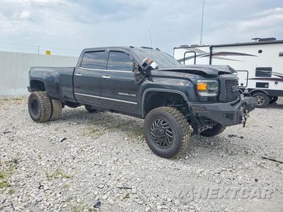 Czwarte zdjęcie samochodu z boku: 2015 GMC SIERRA K3500 DENALI VIN:1GT424E86FF109389 - miniatura