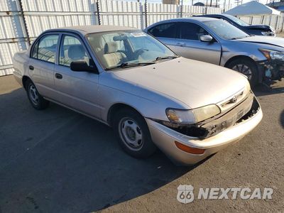 Czwarte zdjęcie samochodu z boku: 1997 TOYOTA COROLLA BASE VIN:1NXBA02E4VZ520986 - miniatura