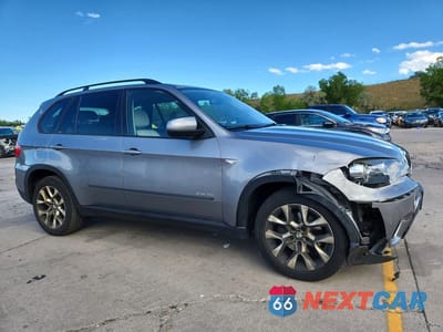 Czwarte zdjęcie samochodu z boku: 2011 BMW X5 XDRIVE35I VIN:5UXZV4C52BL743556 - miniatura