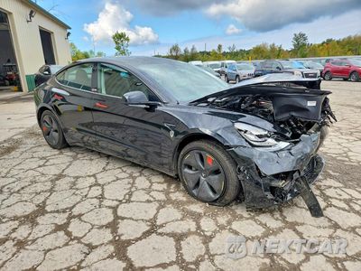 Czwarte zdjęcie samochodu z boku: 2019 TESLA MODEL 3 VIN:5YJ3E1EA6KF399300 - miniatura