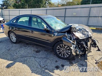 Czwarte zdjęcie samochodu z boku: 2011 HYUNDAI AZERA VIN:KMHFC4DD2BA533059 - miniatura