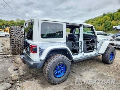 Trzecie zdjęcie samochodu z tyłu: 2023 JEEP WRANGLER RUBICON 4XE VIN:1C4JJXR60PW502404 - miniatura