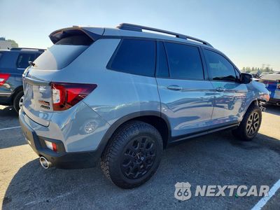 Trzecie zdjęcie samochodu z tyłu: 2022 HONDA PASSPORT TRAIL SPORT VIN:5FNYF8H6XNB010052 - miniatura