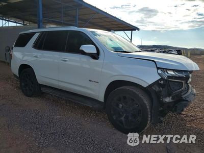 Czwarte zdjęcie samochodu z boku: 2022 CHEVROLET TAHOE C1500 LT VIN:1GNSCNKD0NR325691 - miniatura