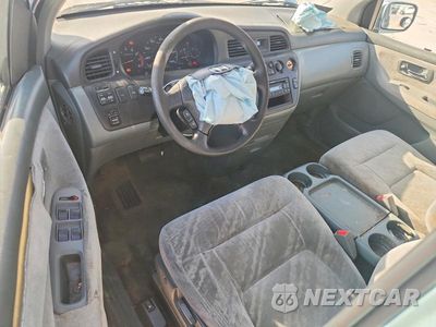 Zdjęcie 8 z 13 samochodu: 2002 HONDA ODYSSEY EX VIN:2HKRL18652H588710 - miniatura