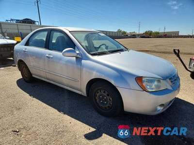 Czwarte zdjęcie samochodu z boku: 2006 KIA SPECTRA EX VIN:KNAFE121465277640 - miniatura