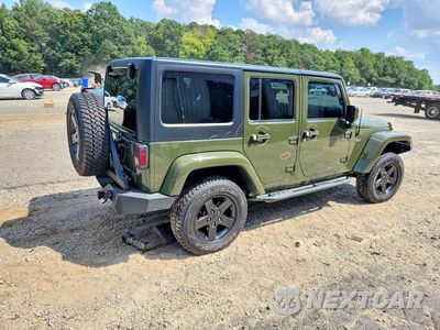 Trzecie zdjęcie samochodu z tyłu: 2016 JEEP WRANGLER UNLIMITED SAHARA VIN:1C4BJWEG5GL293031 - miniatura
